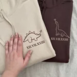 Dinosaurs Embroidered Matching Hoodie with custom initials. Cozy, romantic, and perfect for anniversaries or Valentine’s Day.