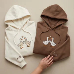 Duck embroidered matching hoodie for couples. Personalized sleeves, cozy fit, perfect Valentineβs Day or anniversary gift.