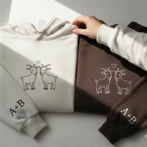 Goat Embroidered Couple Hoodies with custom sleeves. Cozy, symbolic, and perfect for gifting. Ideal for Valentine’s Day or anniversaries.