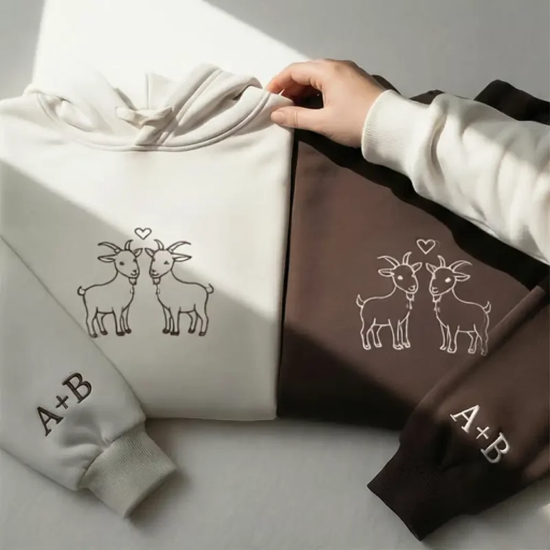 goat-embroidered-couple-hoodie-3 Goat Embroidered Couple Hoodies With Custom Sleeves. Cozy, Symbolic, And Perfect For Gifting. Ideal For Valentine’s Day Or Anniversaries.