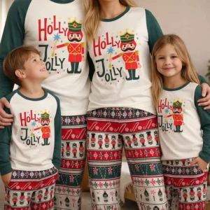 matching family christmas pajamas nutcracker holly jolly set with festive tree and fireplace background