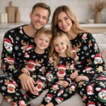 matching family christmas pajamas with santa reindeer snowflakes and gifts worn by parents and children